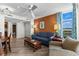Comfortable living room features a ceiling fan, wood floors, and bright window views at 5200 N Ocean Blvd. # 632, Myrtle Beach, SC 29577