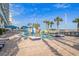 Outdoor splash pad with colorful playground equipment and lounge chairs, perfect for Gathering fun at 5200 N Ocean Blvd. # 632, Myrtle Beach, SC 29577