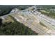 Aerial view of a new construction community with green space, ponds, and easy highway access at 532 Duvall St., Longs, SC 29568