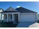 Charming single-story home featuring a two-car garage, well-maintained lawn, and craftsman-style design at 532 Duvall St., Longs, SC 29568