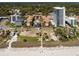 Aerial view of the property showcasing the buildings, pools, landscaping, and beach access at 5507 N Ocean Blvd. # 105, Myrtle Beach, SC 29577