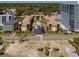 Aerial view showcasing buildings, parking, landscaping, and proximity to the beach at 5507 N Ocean Blvd. # 105, Myrtle Beach, SC 29577