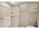 Clean bathroom with a glass door walk-in shower, with white tiling and silver hardware at 5507 N Ocean Blvd. # 105, Myrtle Beach, SC 29577