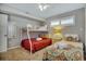 Bedroom featuring bunk beds, a twin bed, neutral carpeting, and bright natural light at 5507 N Ocean Blvd. # 105, Myrtle Beach, SC 29577