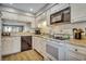 Bright kitchen featuring white cabinetry, granite countertops, and stainless steel appliances at 5507 N Ocean Blvd. # 105, Myrtle Beach, SC 29577
