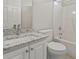 Bright bathroom featuring a granite countertop and a shower over tub combination at 561 Bucks Trail, Longs, SC 29568