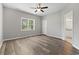 Bedroom featuring a window letting in natural light, wood-look floors, and neutral paint colors at 561 Bucks Trail, Longs, SC 29568