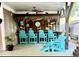 Outdoor bar area with seating and a tiki-style roof at 6001-1783 S Kings Hwy., Myrtle Beach, SC 29575