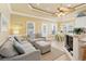 Inviting living room with ample seating, tile floors, and natural light, adjacent to the dining space at 6001-1783 S Kings Hwy., Myrtle Beach, SC 29575