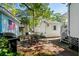 Inviting backyard featuring a brick patio and outdoor dining set at 6001-7035 S Kings Hwy., Myrtle Beach, SC 29575