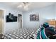 Bedroom with a TV, ceiling fan, a patterned bedspread, and an open closet at 6001-7035 S Kings Hwy., Myrtle Beach, SC 29575