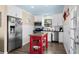 Bright, efficient kitchen with stainless steel appliances, white cabinets, and a functional center island at 6001-7035 S Kings Hwy., Myrtle Beach, SC 29575