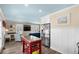 Open-concept layout showcasing the kitchen's island, stainless steel appliances, and seamless flow to the living area at 6001-7035 S Kings Hwy., Myrtle Beach, SC 29575