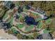 Aerial view of a fun miniature golf course with landscaping, water features, and shade at 6001-7035 S Kings Hwy., Myrtle Beach, SC 29575