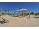 Fun sandy playground featuring climbing structures, slides, and a shaded play area at 6001-7035 S Kings Hwy., Myrtle Beach, SC 29575