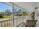 Inviting covered porch featuring comfortable seating and serene neighborhood views at 6001-7035 S Kings Hwy., Myrtle Beach, SC 29575