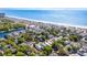 Scenic aerial view of the charming beach community with vibrant ocean views and tree-lined streets at 6001-Mh409 S Kings Hwy., Myrtle Beach, SC 29575