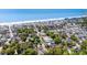 Beautiful aerial view of a coastal neighborhood, showcasing the proximity to the ocean and serene pond at 6001-Mh409 S Kings Hwy., Myrtle Beach, SC 29575