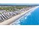 Aerial view of the community, beach, and the Atlantic Ocean at 6001-Mh409 S Kings Hwy., Myrtle Beach, SC 29575