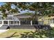 Inviting covered back deck features outdoor seating, perfect for entertaining or relaxing outdoors at 6001-Mh409 S Kings Hwy., Myrtle Beach, SC 29575