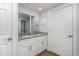 Bathroom featuring double sinks with granite counters, white cabinets, and a mirror at 6001-Mh409 S Kings Hwy., Myrtle Beach, SC 29575