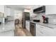 Modern kitchen with stainless steel appliances, granite countertops, and stylish backsplash at 6001-Mh409 S Kings Hwy., Myrtle Beach, SC 29575