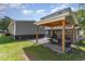 Carport offering convenient parking for a golf cart in a gravel area outside the home at 6001-Mh409 S Kings Hwy., Myrtle Beach, SC 29575