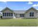 A spacious backyard with a well-manicured lawn and plenty of space for outdoor activities and relaxation at 736 Lalton Dr., Conway, SC 29526