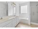 Bright bathroom featuring double vanity, soaking tub, and glass door shower at 736 Lalton Dr., Conway, SC 29526
