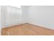 Empty bedroom with hardwood floors and a window covered with sheer curtains at 736 Lalton Dr., Conway, SC 29526