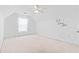 Upstairs bedroom featuring sloped ceilings, ceiling fan, and a relaxing ambiance at 736 Lalton Dr., Conway, SC 29526