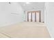 Spacious living room features high ceilings, fan, and soft carpeting at 736 Lalton Dr., Conway, SC 29526