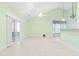 Inviting living space with tile floors, ceiling fan, and sliding glass doors providing a light and airy atmosphere at 736 Lalton Dr., Conway, SC 29526