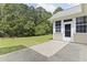 A back patio area with ample room for outdoor seating overlooking the lawn at 736 Lalton Dr., Conway, SC 29526
