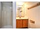 This bathroom is equipped with a standing shower, decorative wallpaper, and a spacious vanity at 742 Tall Oaks Ct., Myrtle Beach, SC 29588