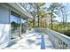 Spacious deck with a view of the surrounding trees, perfect for outdoor relaxation and entertainment at 742 Tall Oaks Ct., Myrtle Beach, SC 29588