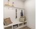 Convenient entryway mudroom featuring hooks, storage, and decor at 745 Choctaw Dr., Conway, SC 29526