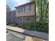Charming two-story townhouse with a brick facade and well-maintained landscaping at 830 44Th Ave. N # B4, Myrtle Beach, SC 29577