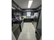 Modern kitchen with stainless steel appliances, granite countertops, and ample cabinet space at 830 44Th Ave. N # B4, Myrtle Beach, SC 29577