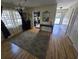 Bright living room featuring hardwood floors, ample natural light, and open floor plan at 830 44Th Ave. N # B4, Myrtle Beach, SC 29577