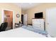 Bedroom with a white bed and an adjacent bathroom at 830 Howard Ave. # D, Myrtle Beach, SC 29577