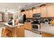 Well-equipped kitchen with stainless steel appliances, granite countertops, and ample cabinet space at 830 Howard Ave. # D, Myrtle Beach, SC 29577
