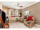 Comfortable living room featuring a striped sofa and two recliner chairs at 830 Howard Ave. # D, Myrtle Beach, SC 29577