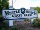 Myrtle Beach State Park sign at the entrance to the park at 830 Howard Ave. # D, Myrtle Beach, SC 29577