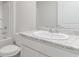 Well-lit bathroom featuring a white vanity with a gray countertop and a shower-tub combo at 843 Buttonwood Dr., Conway, SC 29527
