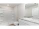 Well-lit bathroom with a shower, granite vanity, and modern fixtures at 843 Buttonwood Dr., Conway, SC 29527