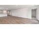 Expansive living room area with modern hardwood flooring and neutral color palette at 843 Buttonwood Dr., Conway, SC 29527