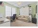 Bedroom featuring a built-in murphy bed, desk, and neutral colored walls at 929 Tidewater Dr., North Myrtle Beach, SC 29582