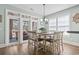 Bright dining area with table and chairs, and access to the outdoor patio at 929 Tidewater Dr., North Myrtle Beach, SC 29582