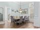 This dining room features a wood table with seating for eight and custom coastal themed decor at 929 Tidewater Dr., North Myrtle Beach, SC 29582